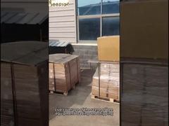 A batch of bee equipment is being loaded onto a vehicle for shipment