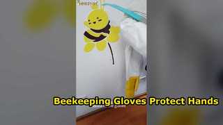 White Sheepskin Beekeeping Gloves and bee hive tool