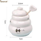 Wholesale White Empty Honey Jar Ceramic Honey Pot with wooden dipper for honey storage