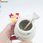 china Honey Pot And Spoon Ceramic White Honey Pot with Lid