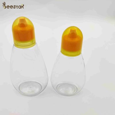 250ml 350ml 500ml Honey Jar And Spoon Plastic Empty Honey Bottles for honey storage